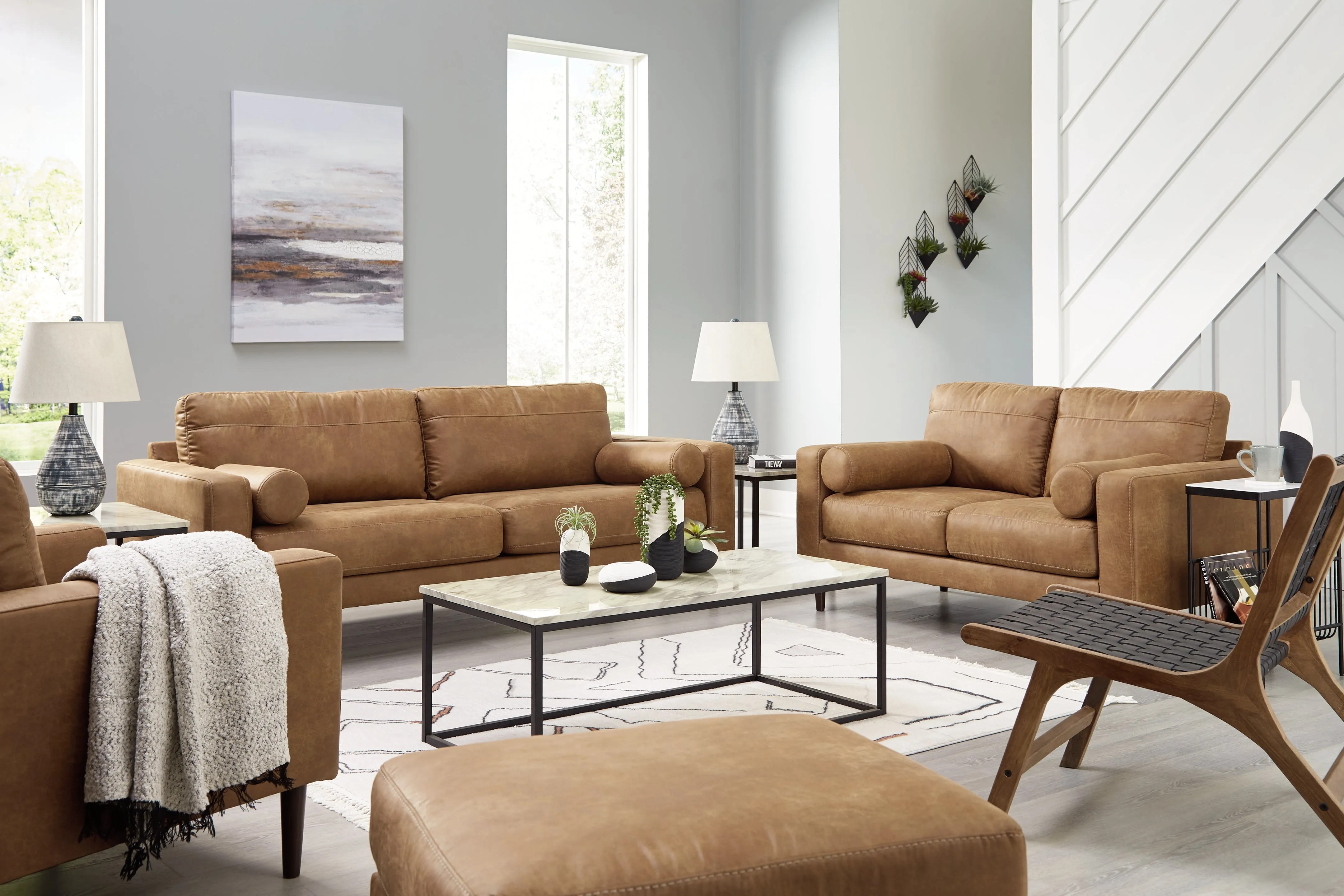 Telora Sofa, Loveseat, Chair and Ottoman in Caramel